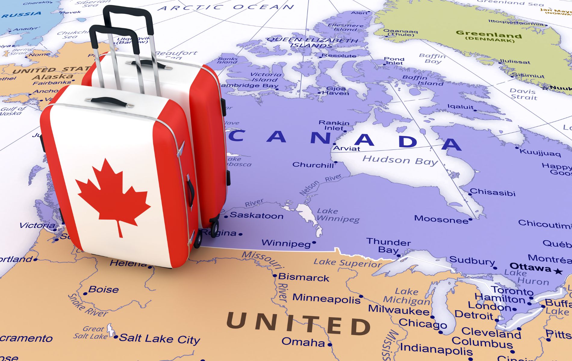 carte du canada avec 2 valises posées dessus